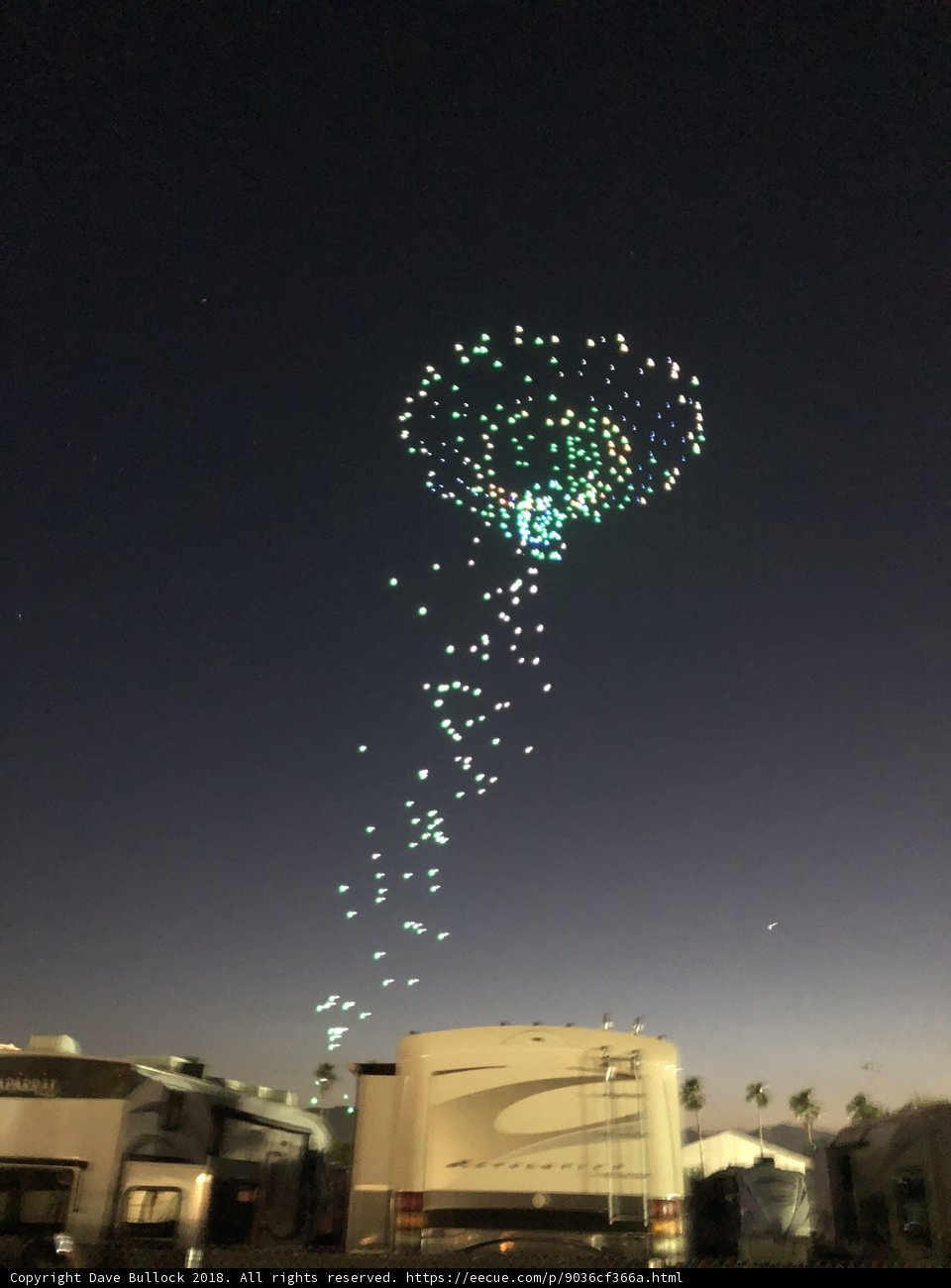 Green Balloon Soaring Above a Night Sky