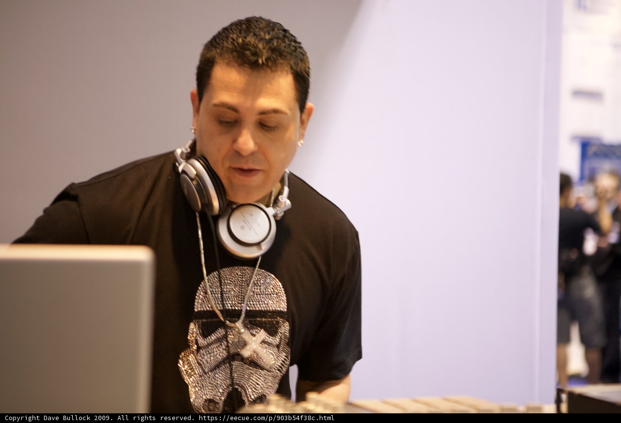 DJ Skribble in the zone with his laptop and headphones