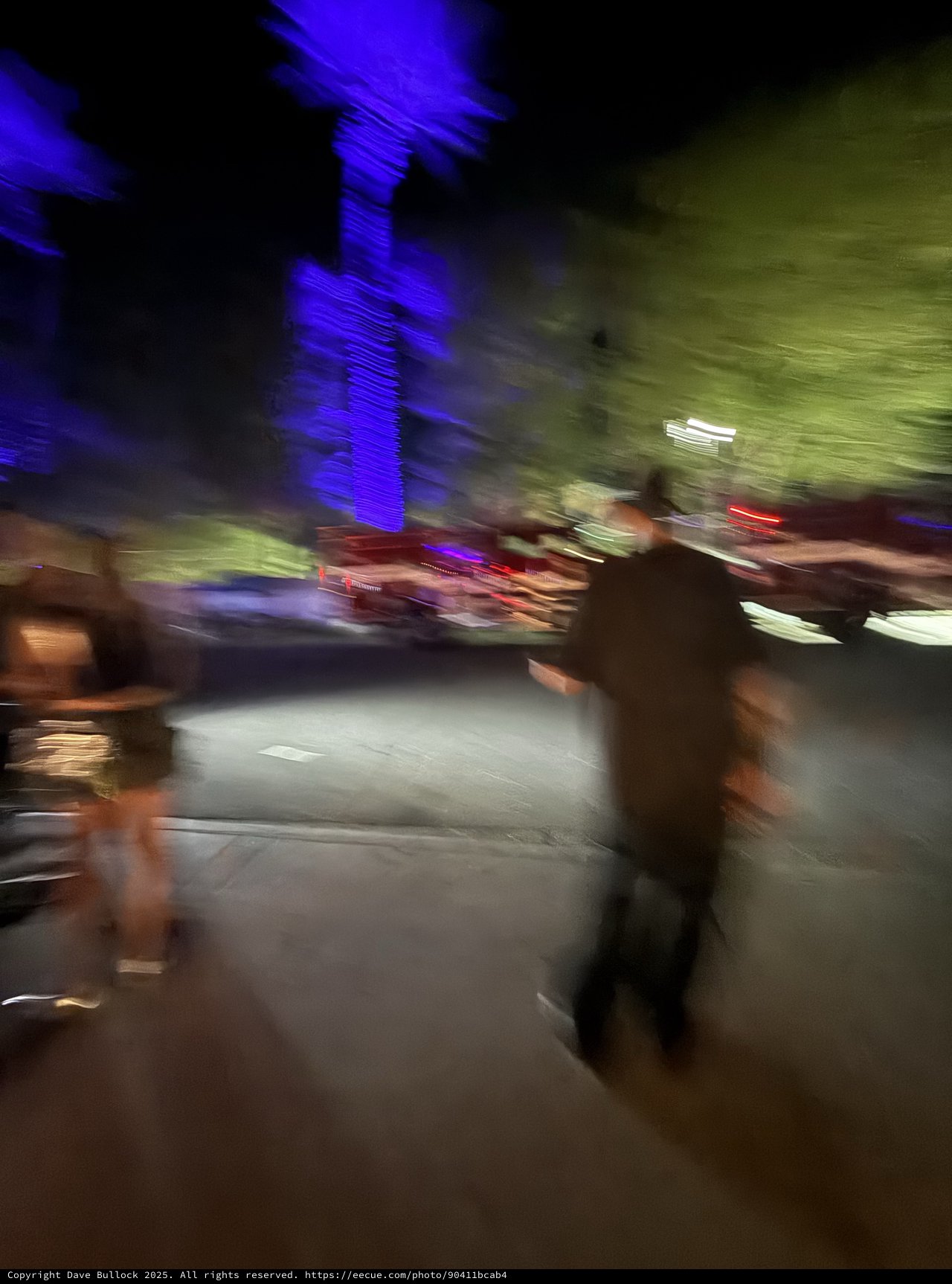 Motion Blur Night Street Scene with Neon Lights