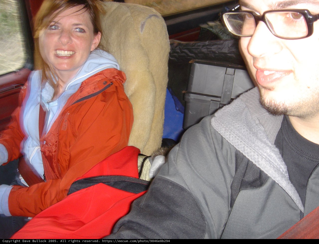 Friends Packed Into a Red Truck on Adventure
