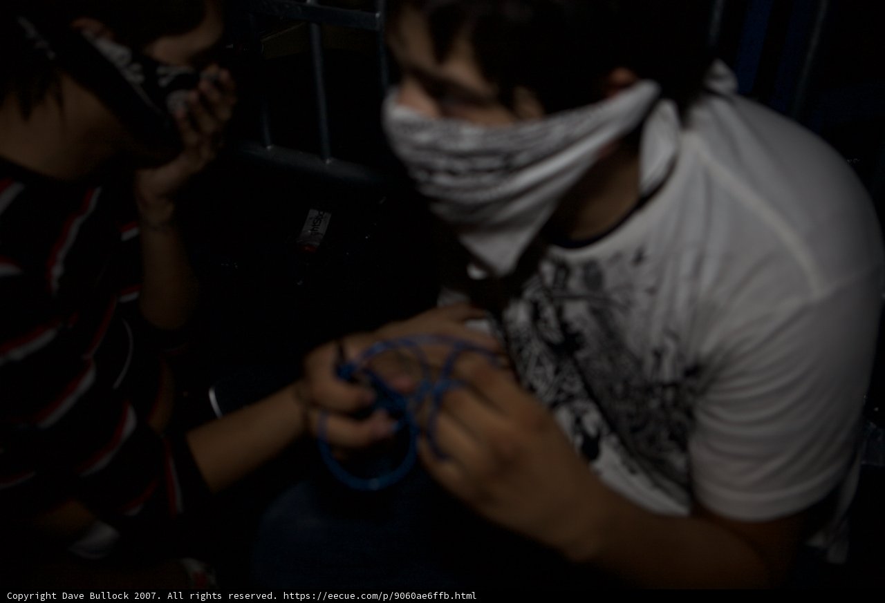 Masked Duo with Blue Cord