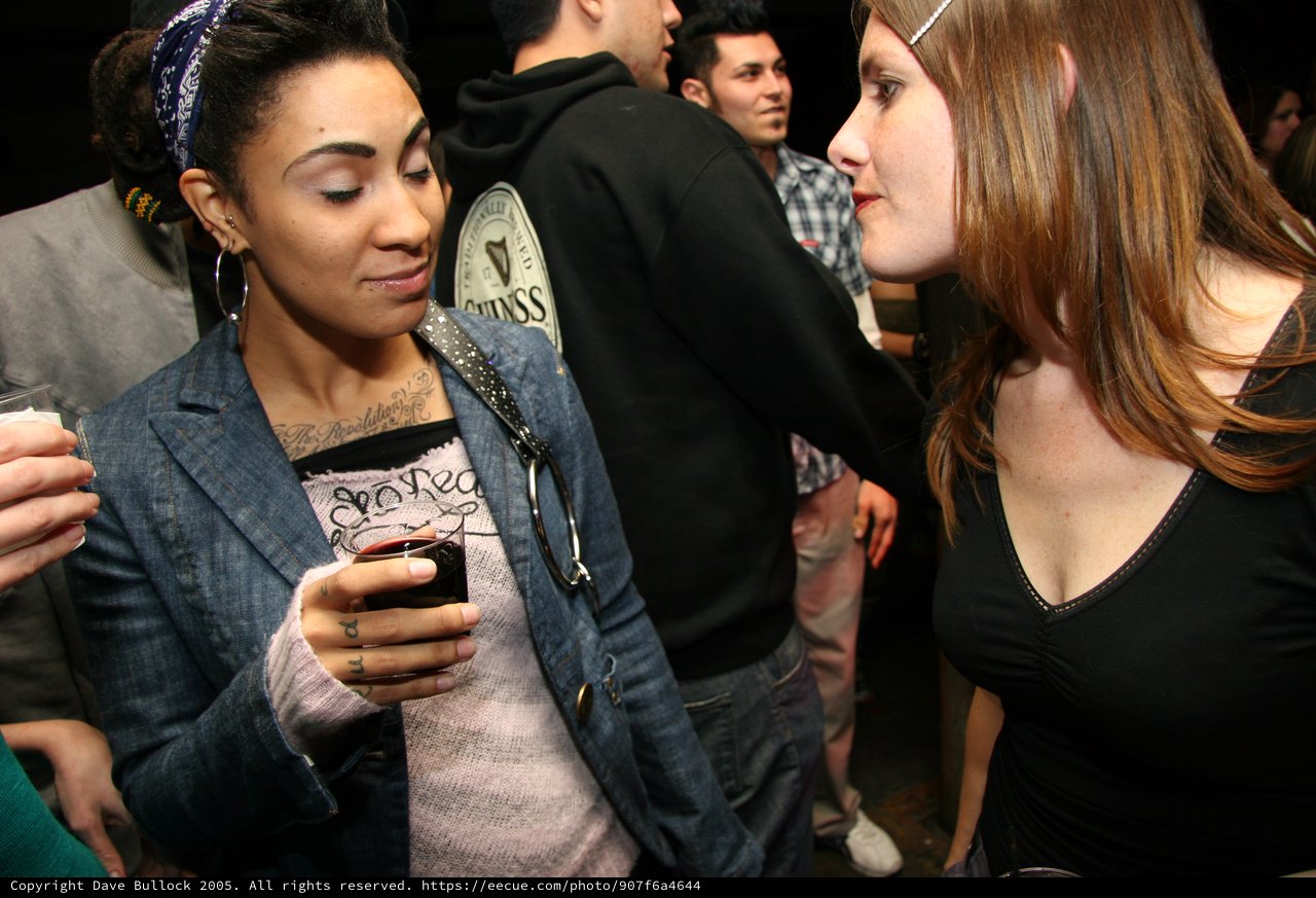 Two Women Sharing a Moment at a Party