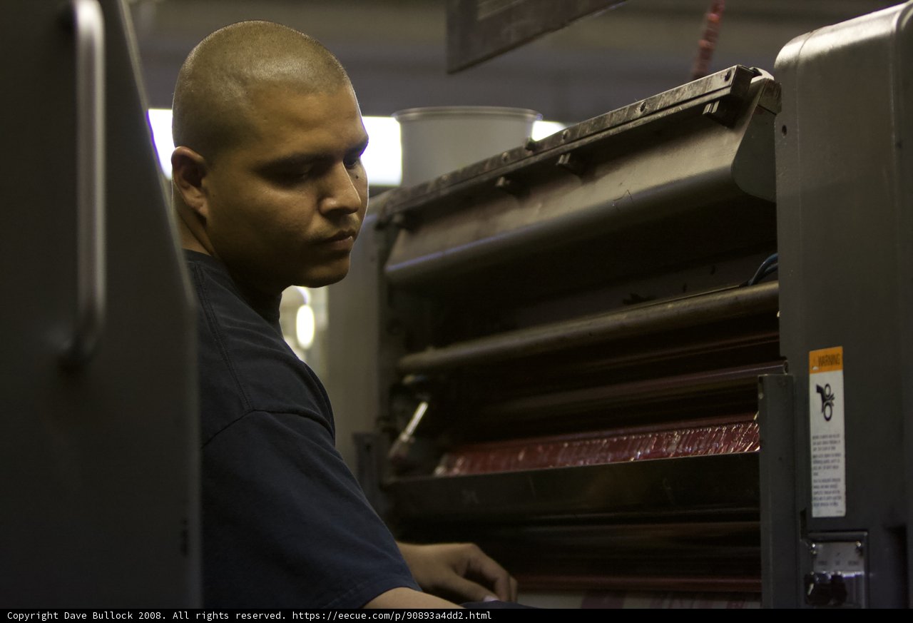 The Man Behind the Printing Machine