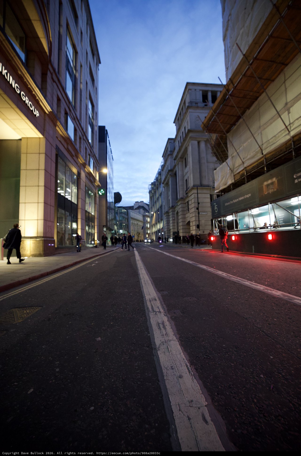 Evening Rush Hour on London's Financial District Street