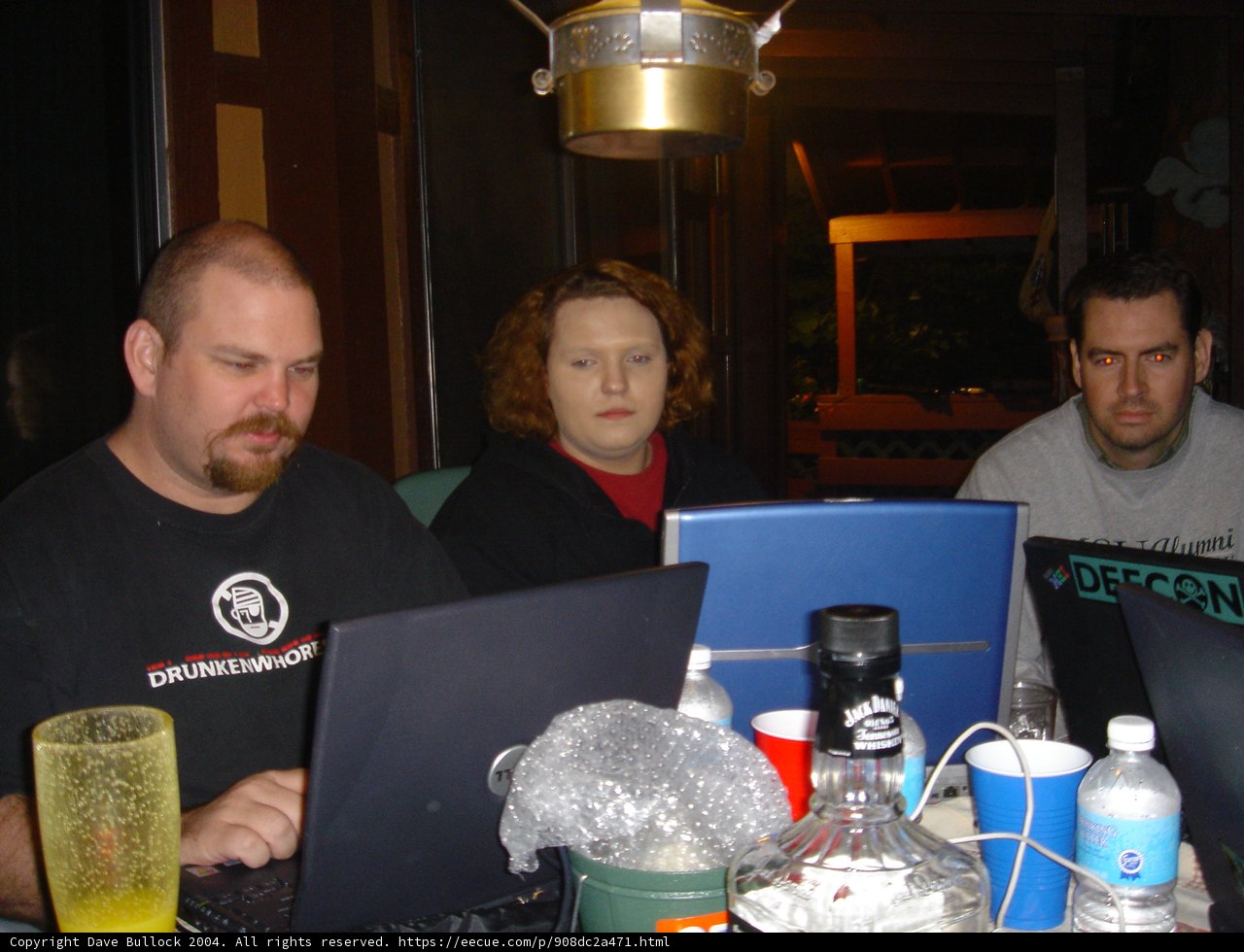Grey Shirted Man Working On Laptop