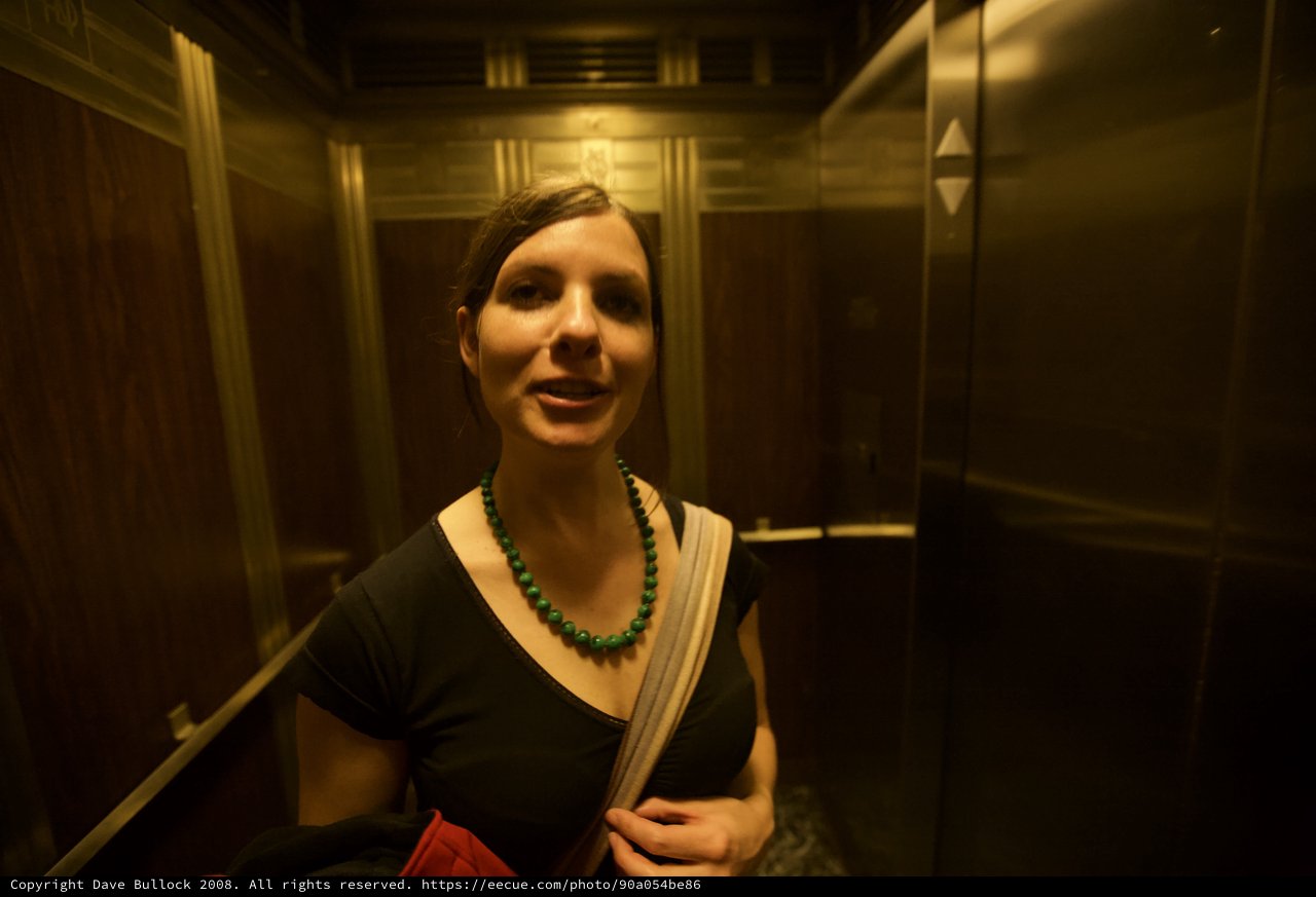 Woman in Elevator During Late Night Art Walk