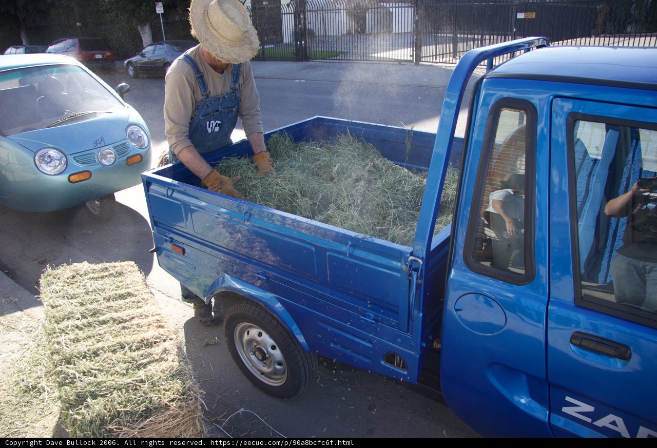 Loading Hay into the Blue Pickup Truck