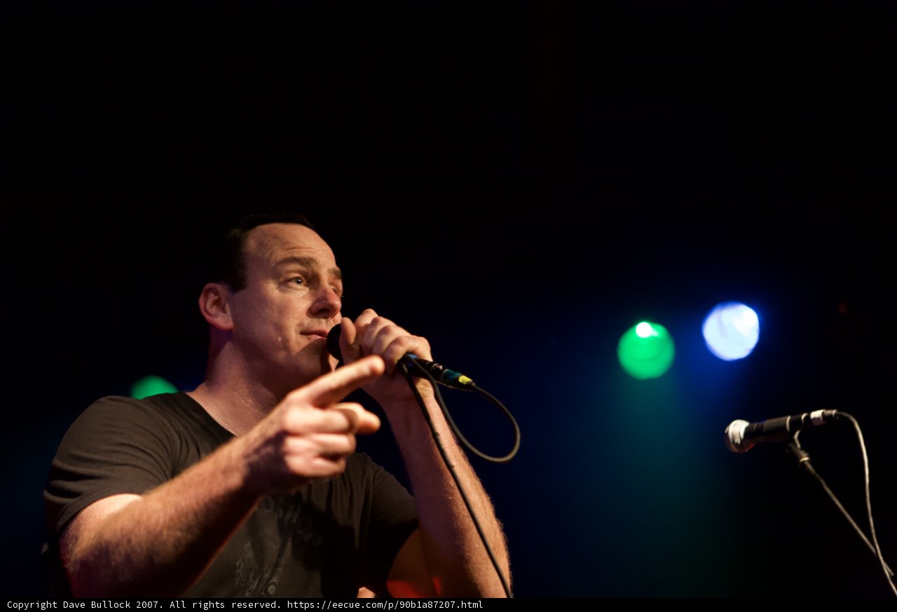 Black Shirted Man Rocks Glasshouse