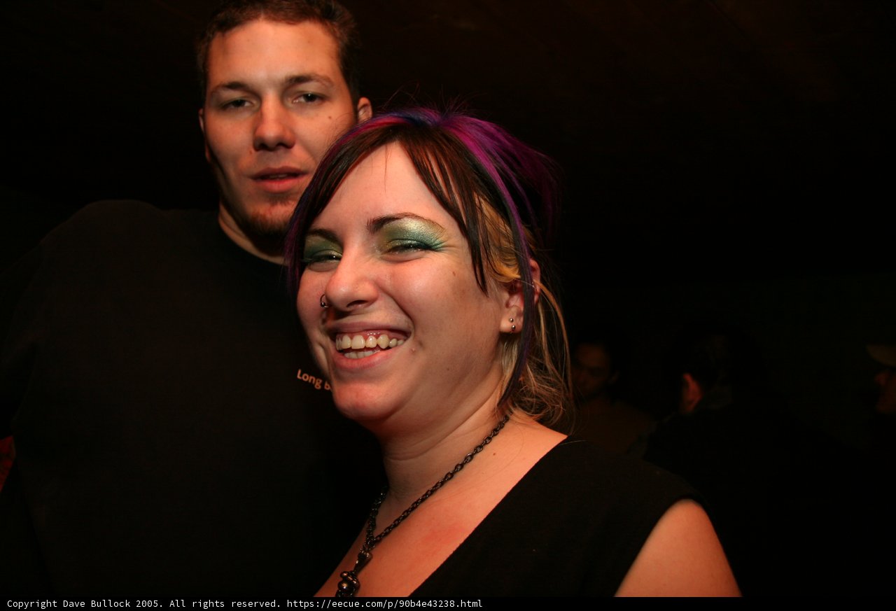 Smiling Couple at Urban Nightclub Party
