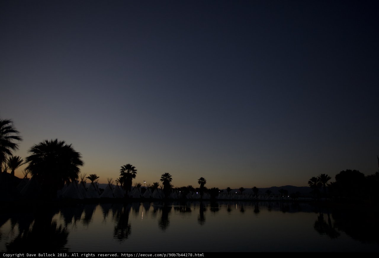 Sunset over Palm Trees and Water