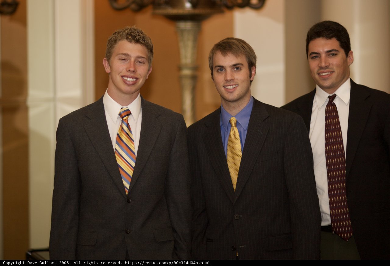 Three Men in Suits Looking Sharp