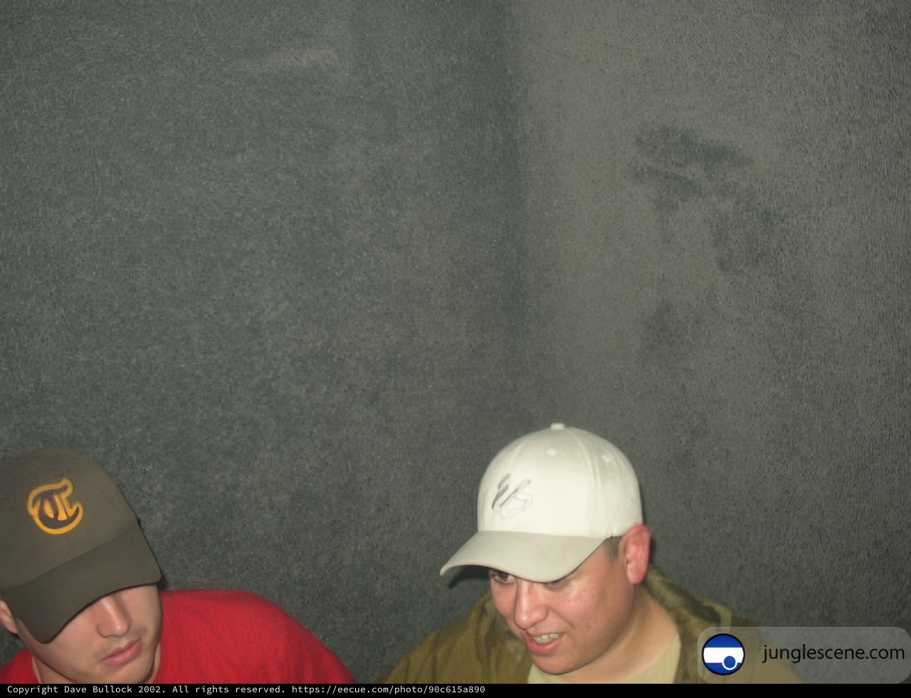 Two Men in Hats Surrounded by Smoke
