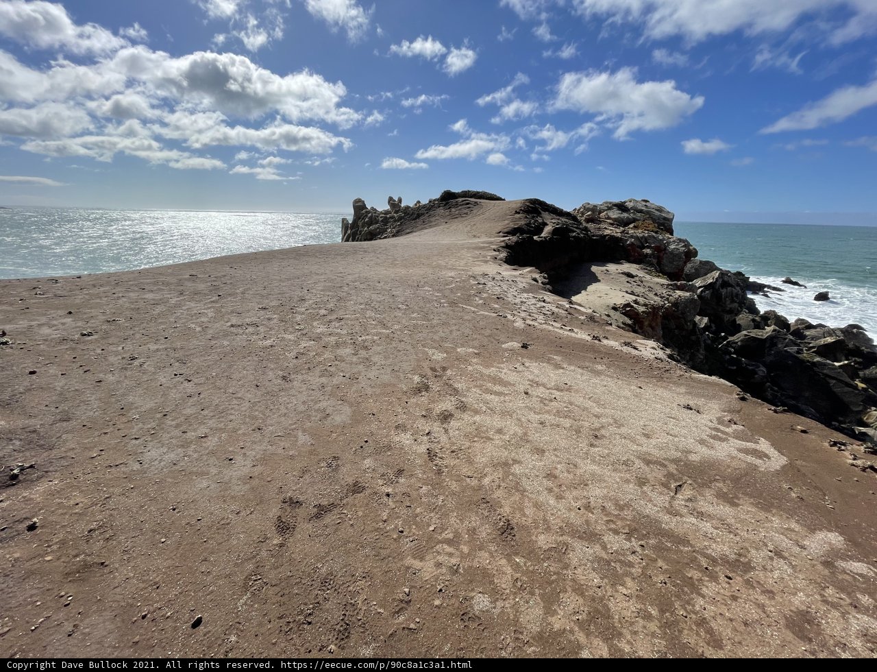 A Serene View of the Pacific Ocean from atop the Cliffs