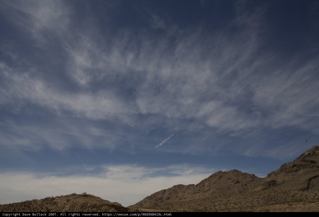 Flying Above the Desert Peaks