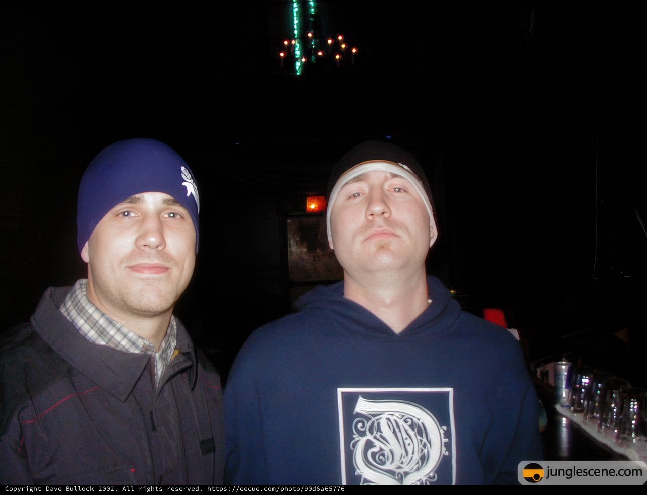 Two Men with Baseball Caps
