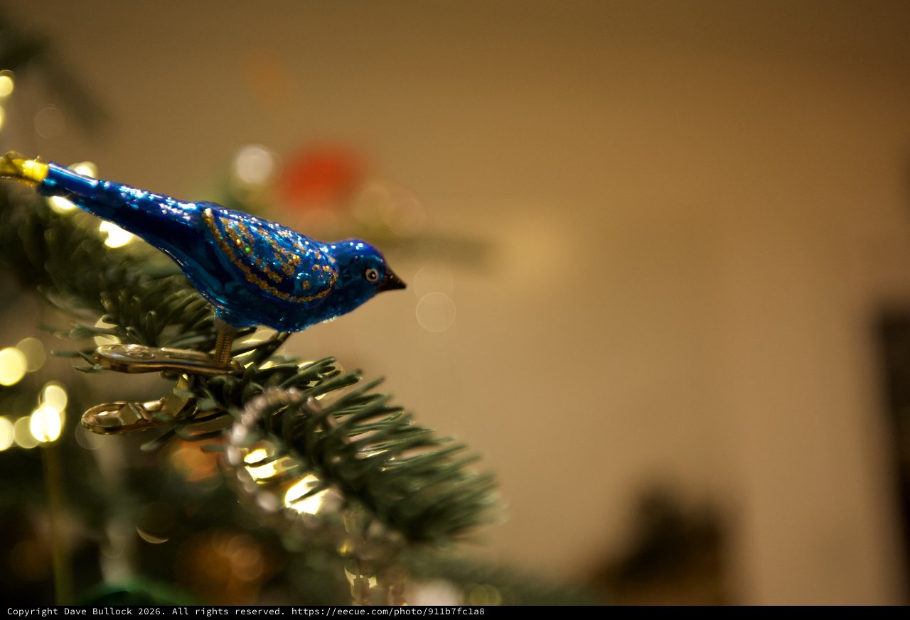 Blue Glass Bird Christmas Tree Ornament with Bokeh Lights