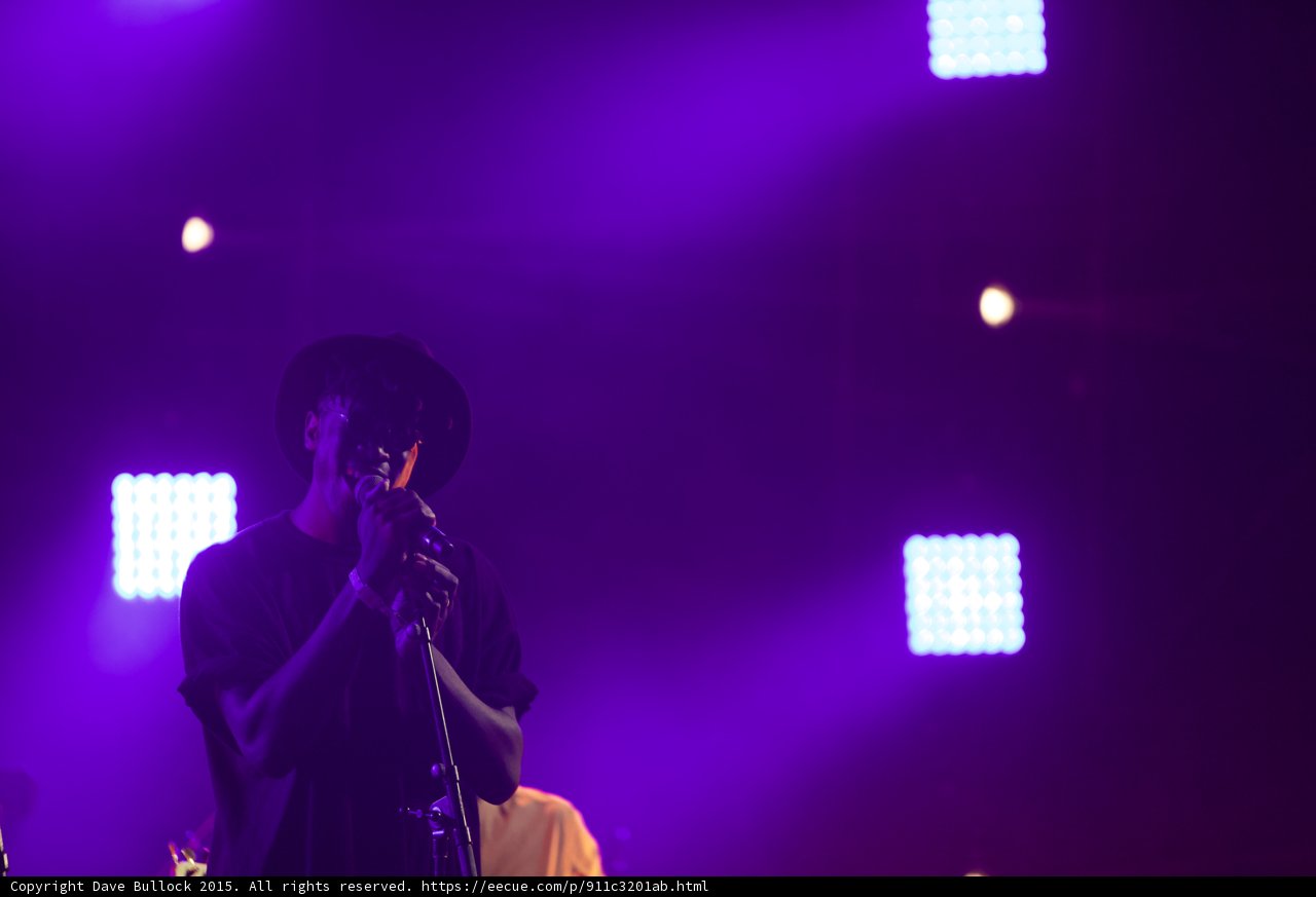 Solange Vocalist Hat Silhouette Singing LED Panels Purple Background