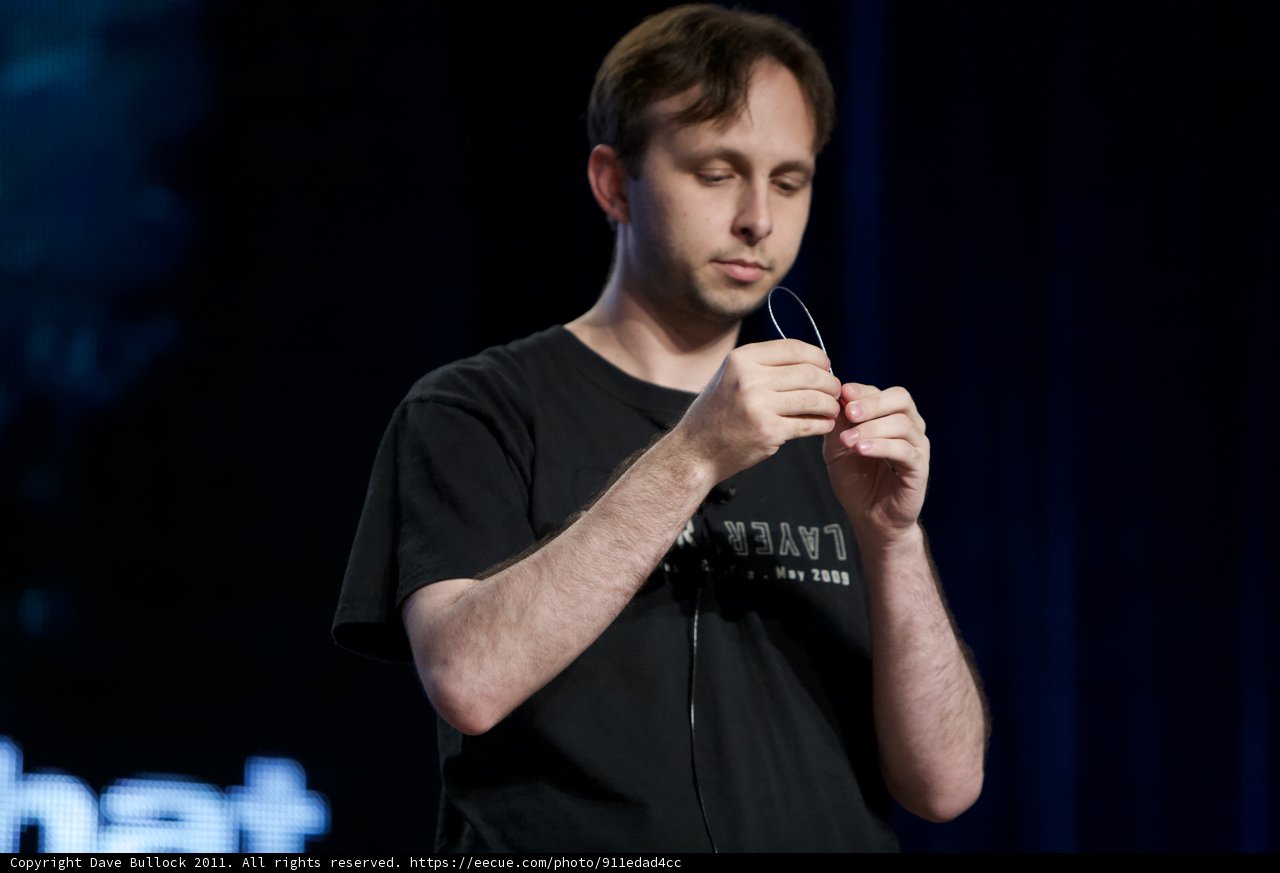 Black-shirted man takes center stage