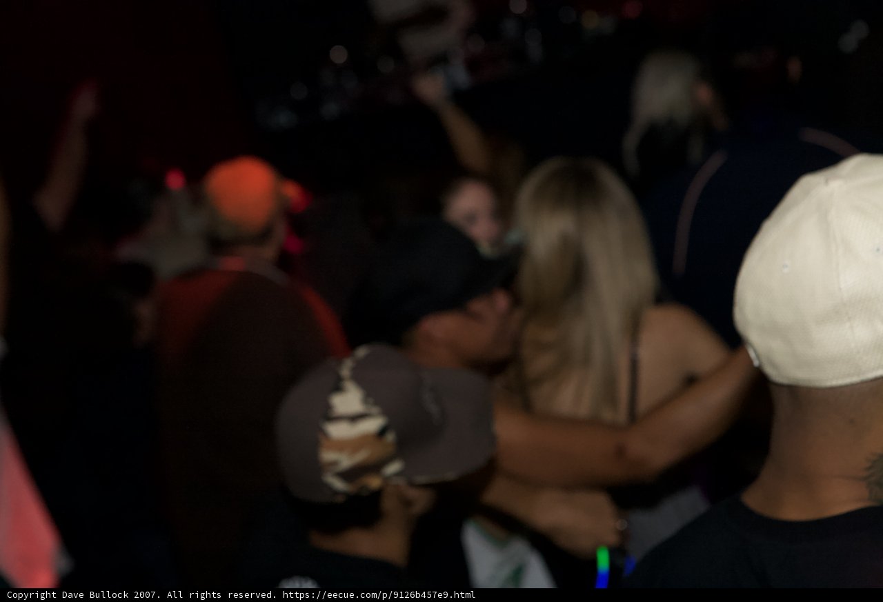 The Hat Man in the Night Club Crowd
