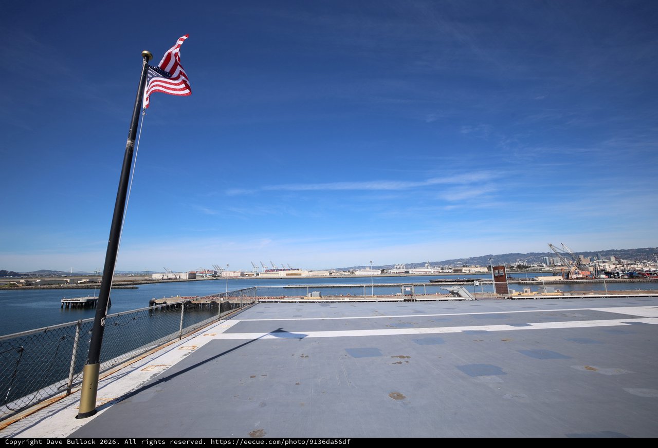 American Flag Flying Over USS Hornet Flight Deck