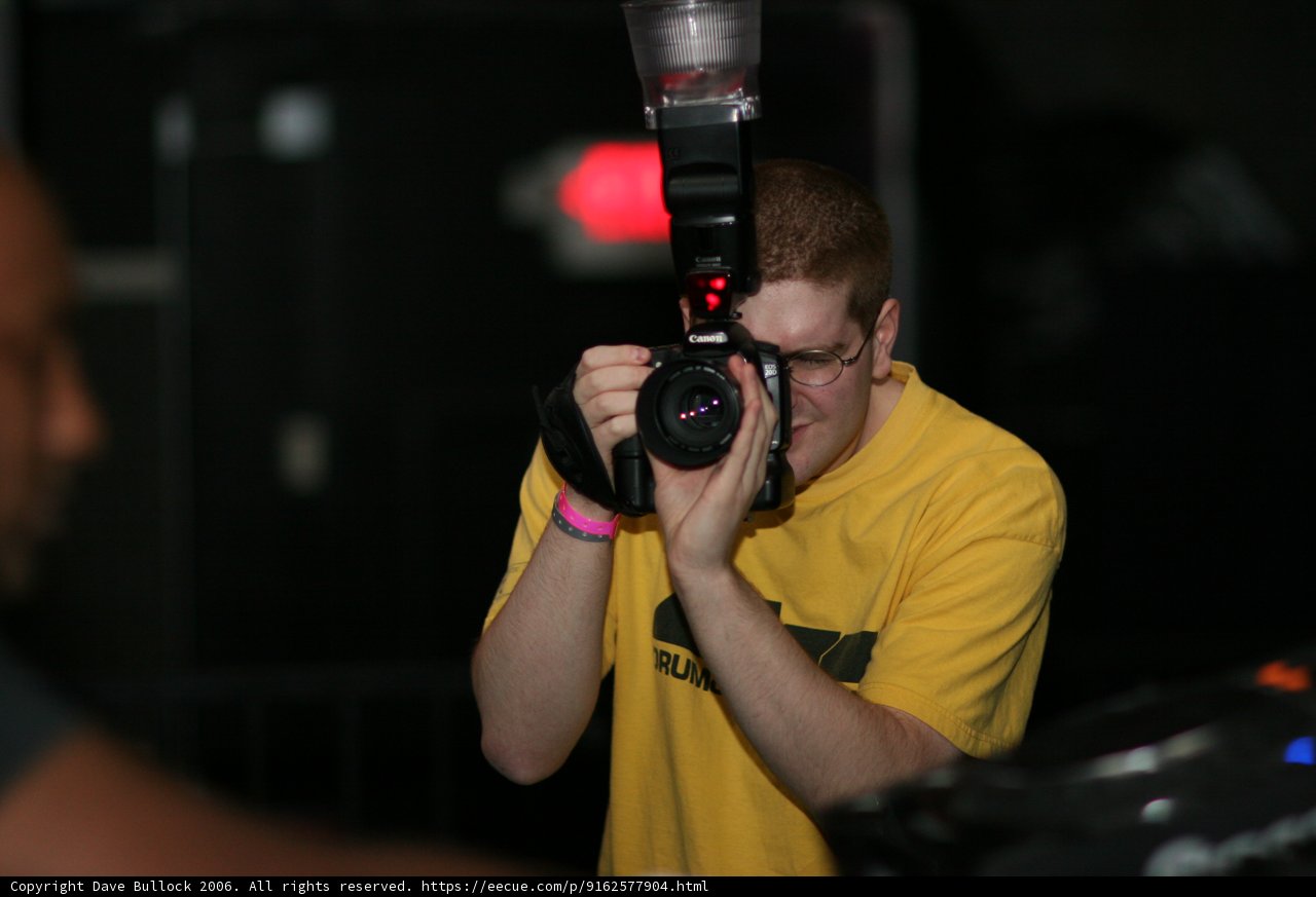 A Man Capturing the Moment with His Camera