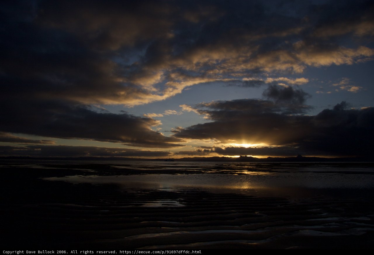 Fiery Sky and Flare on Low Tide