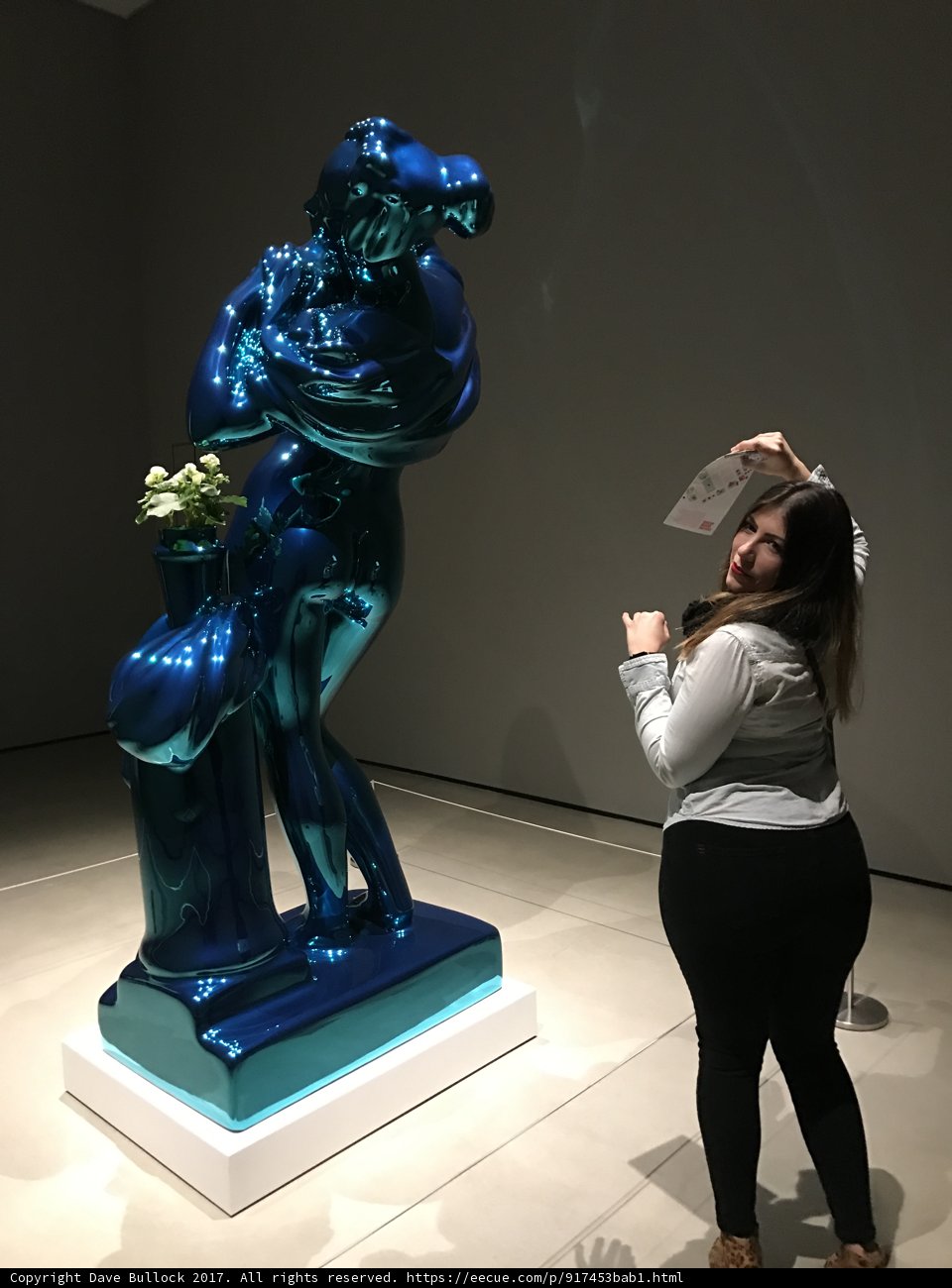 The Woman and the Blue Sculpture