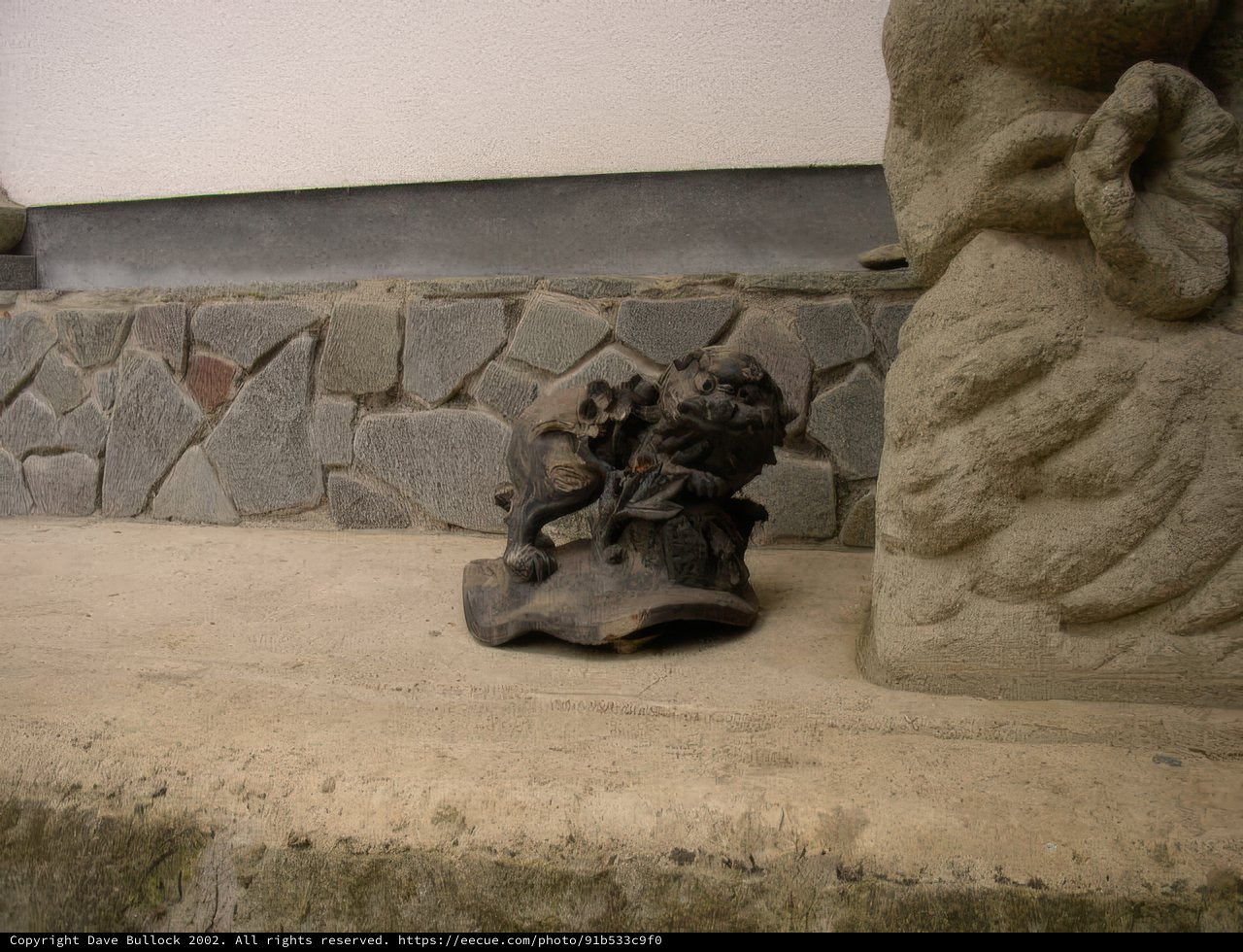 Monkey Statue in Monastery Wall