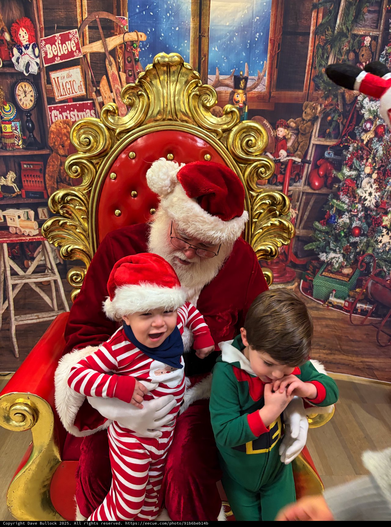 Santa's Workshop Visit with Two Young Children
