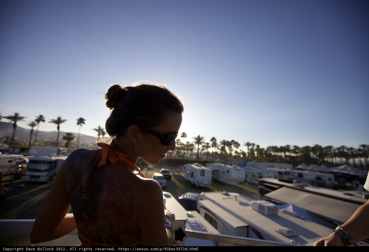 Tattooed Woman Overlooking Coachella Parking Lot