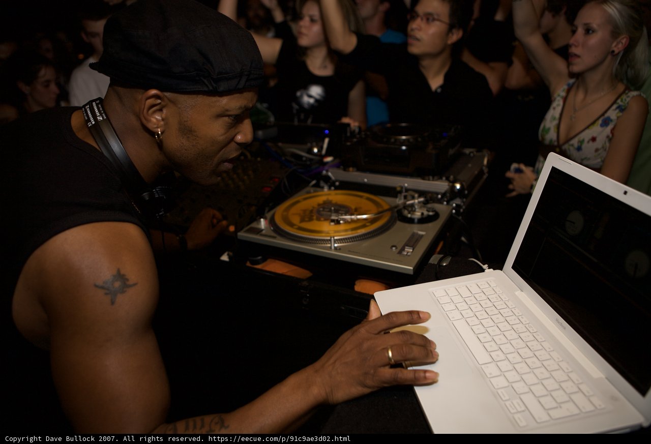 Nightclub DJ in Black Tank Top