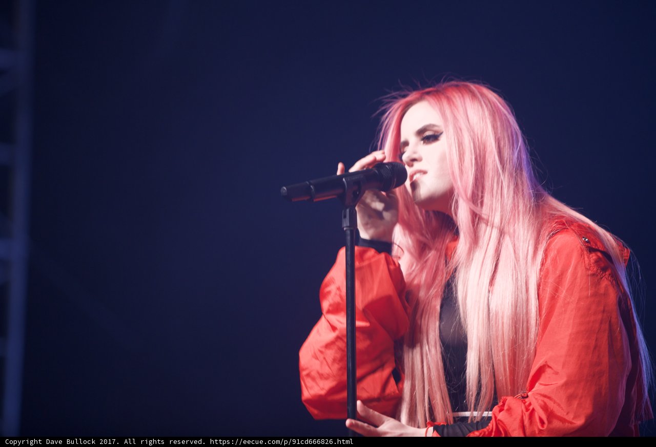Rocking the Stage with Pink Hair