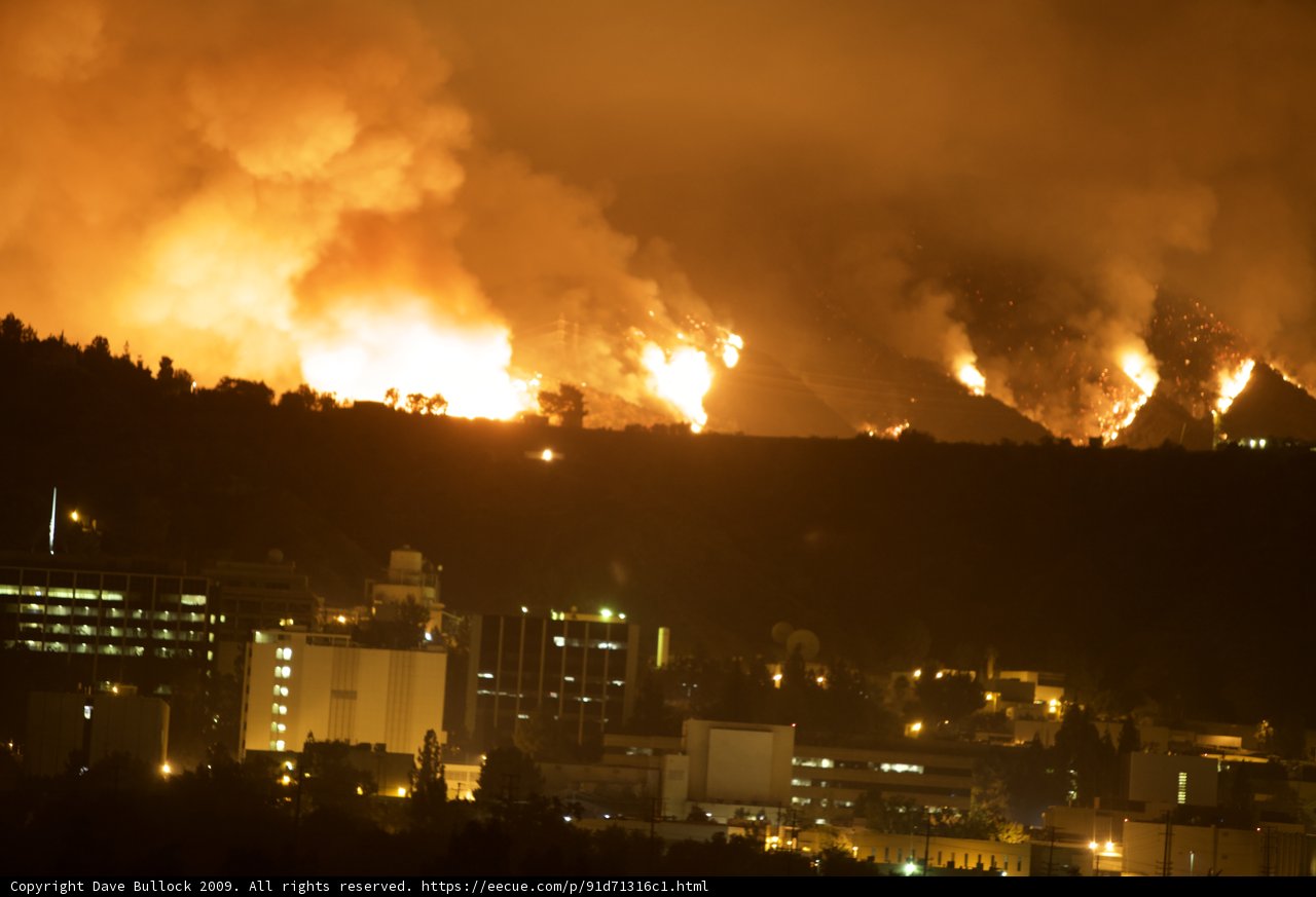 Flames Engulf Cityscape in Station Fire