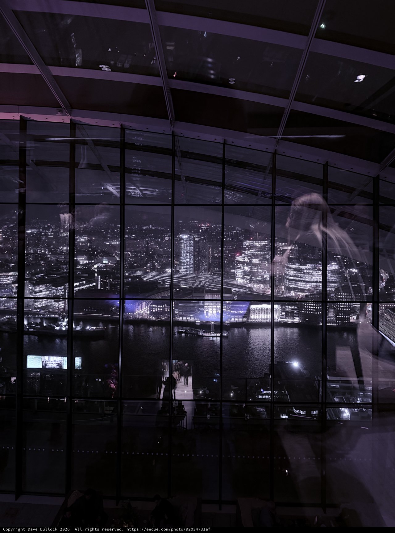 Ghostly Figure in London Skyline Observatory at Night