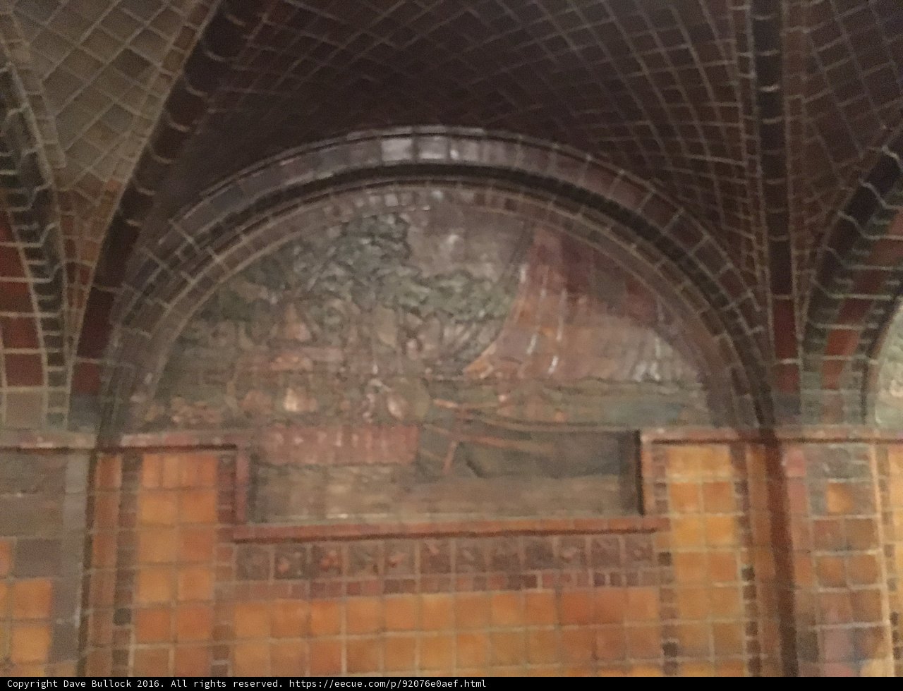 Mural on a Tiled Wall in a Crypt-like Church
