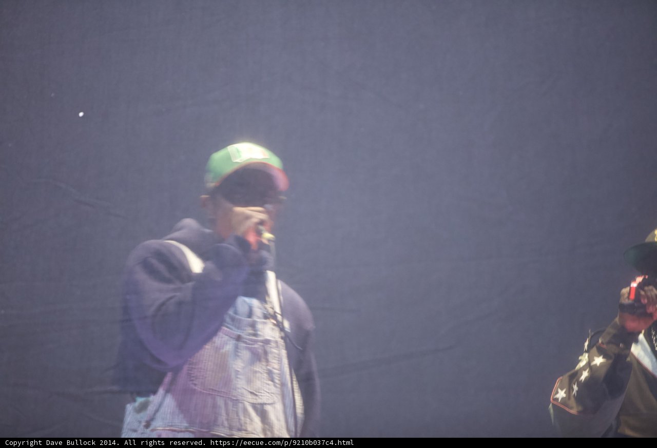 Hat-wearing men take the stage