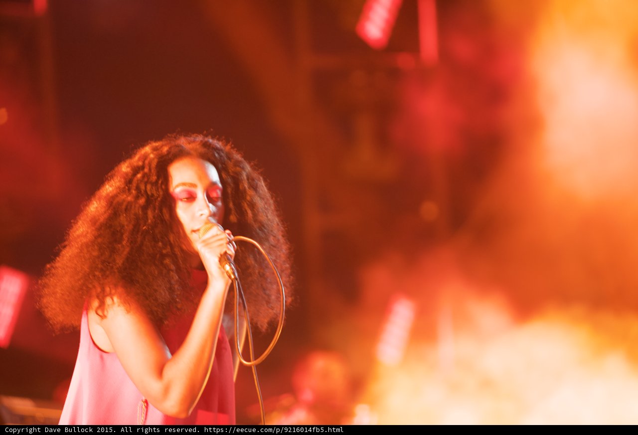 Solange Portrait Eyes Closed Looking Down Orange White Smoke