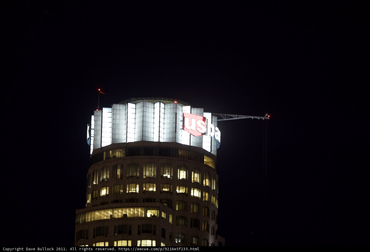 Metropolis Tower glowing in the Night Sky