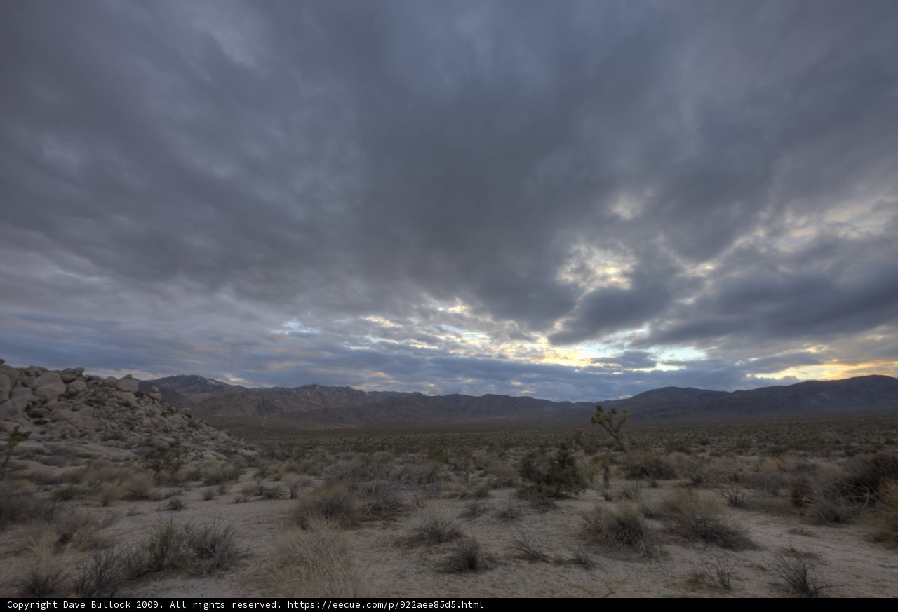 Majestic Mountains Meet Moody Skies