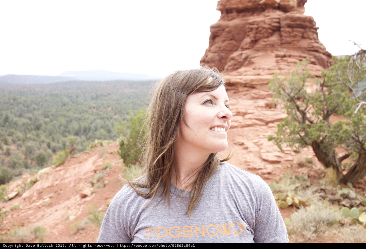 Woman Smiling Among Sedona's Red Rock Formations