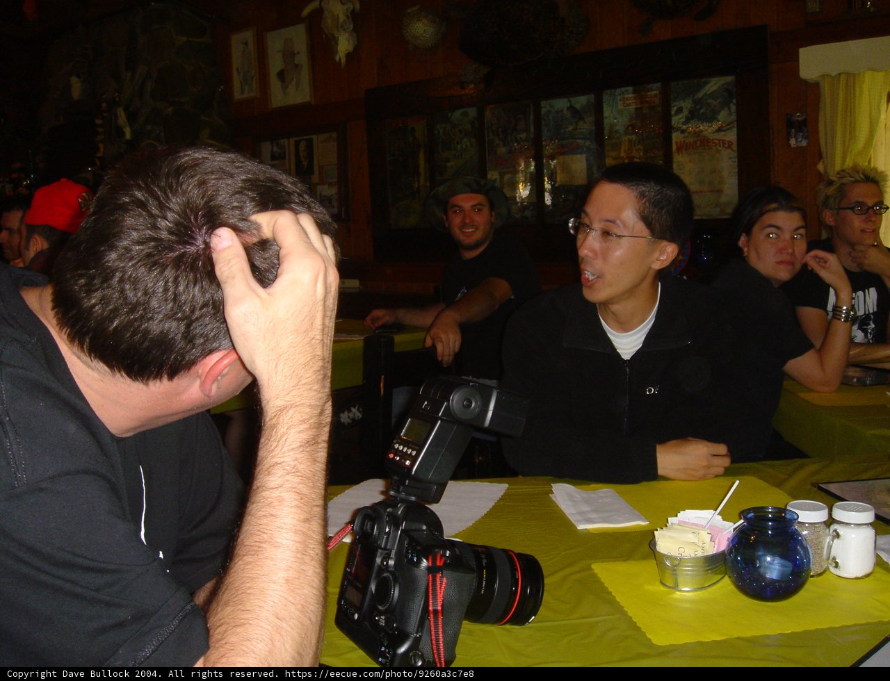 Snapshot of a Photographer at a Pub