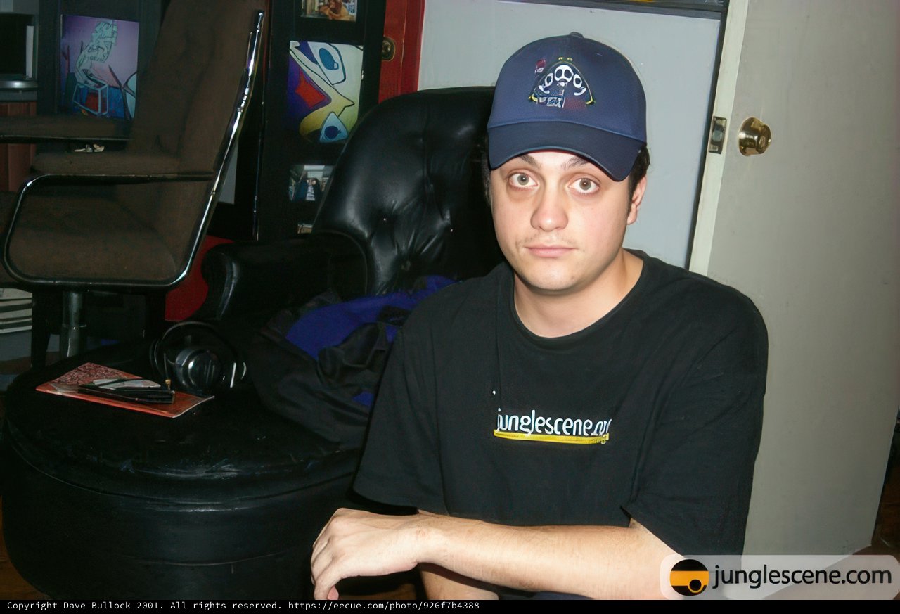 Black Shirt and Baseball Cap Portrait