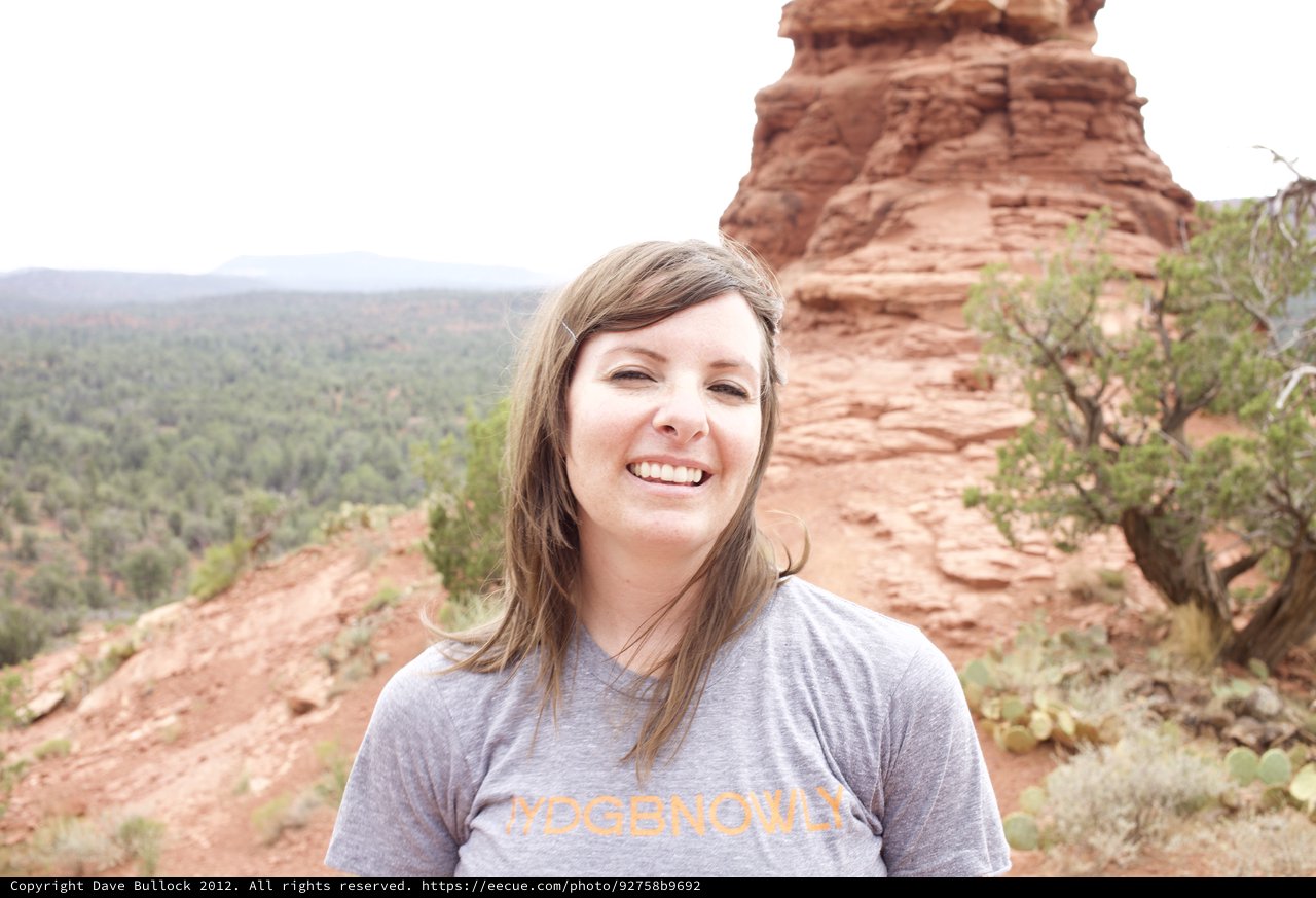 Smiling Hiker Poses Among Sedona Red Rock Formations