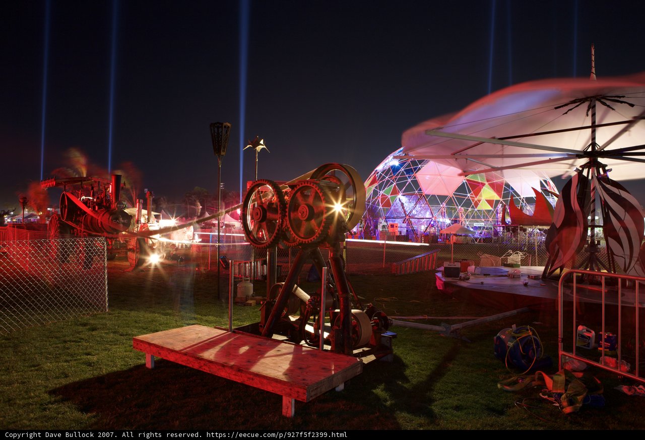 Spectacular Light Show and Wooden Bench at Coachella Carnival