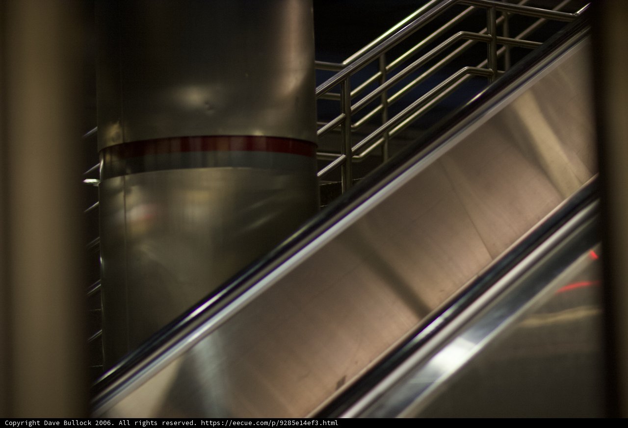 Metal Escalator in Architectural Housing
