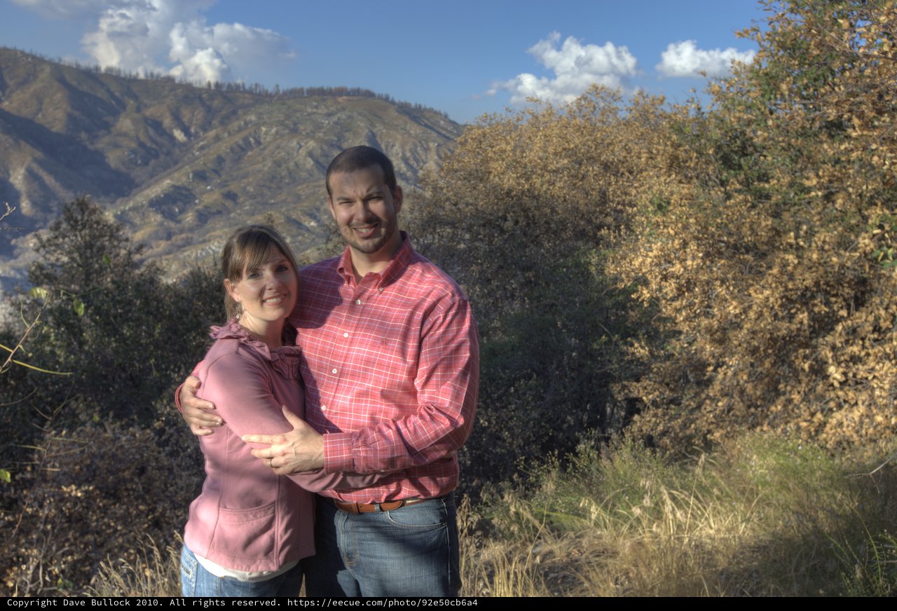 Couple Embracing in Autumn Mountain Wilderness