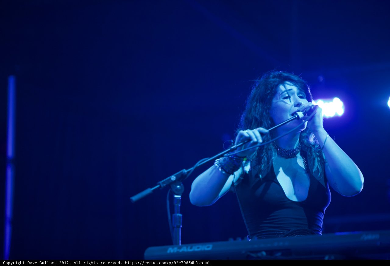 Woman Shines on Stage with Solo Performance