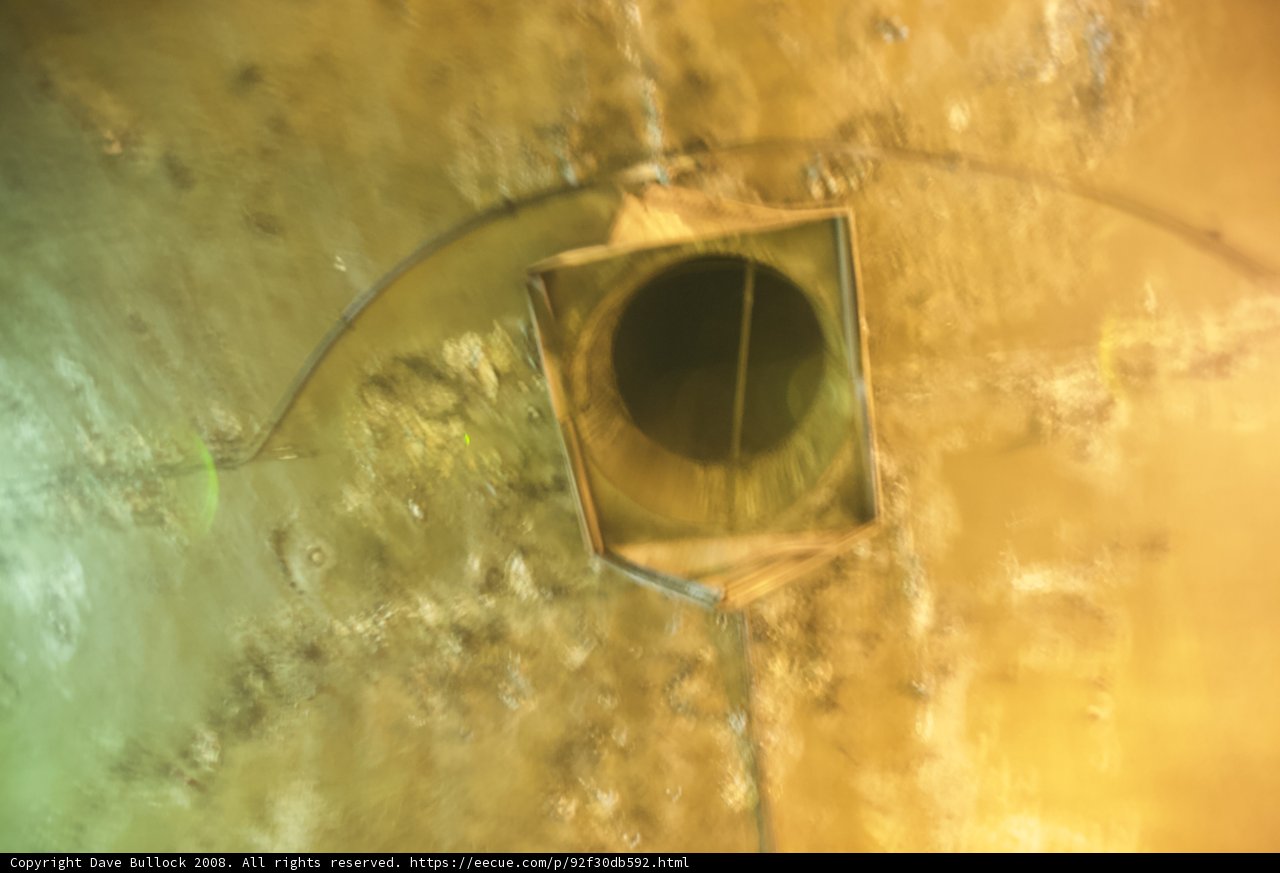 Hole in a Yellow Pipe