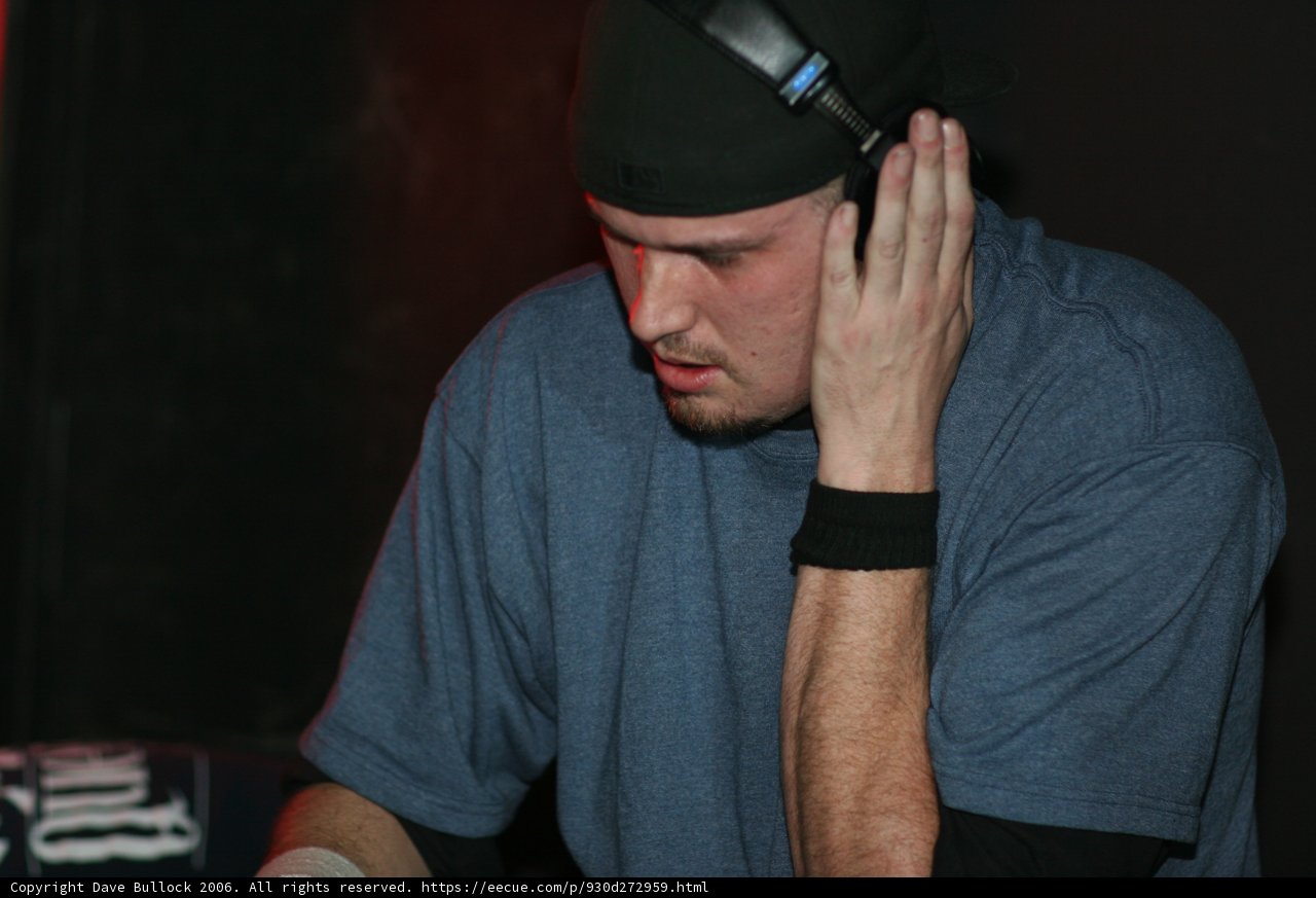 Blue-Shirted Travis with a Baseball Cap
