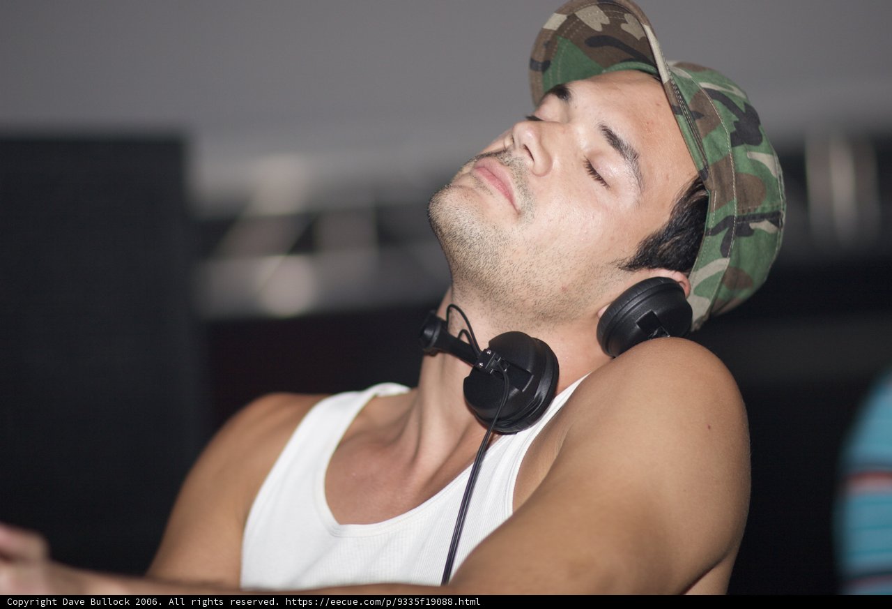 Grooving with Headphones and Hat